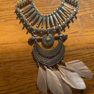 Necklace with intricate embellishments + petals